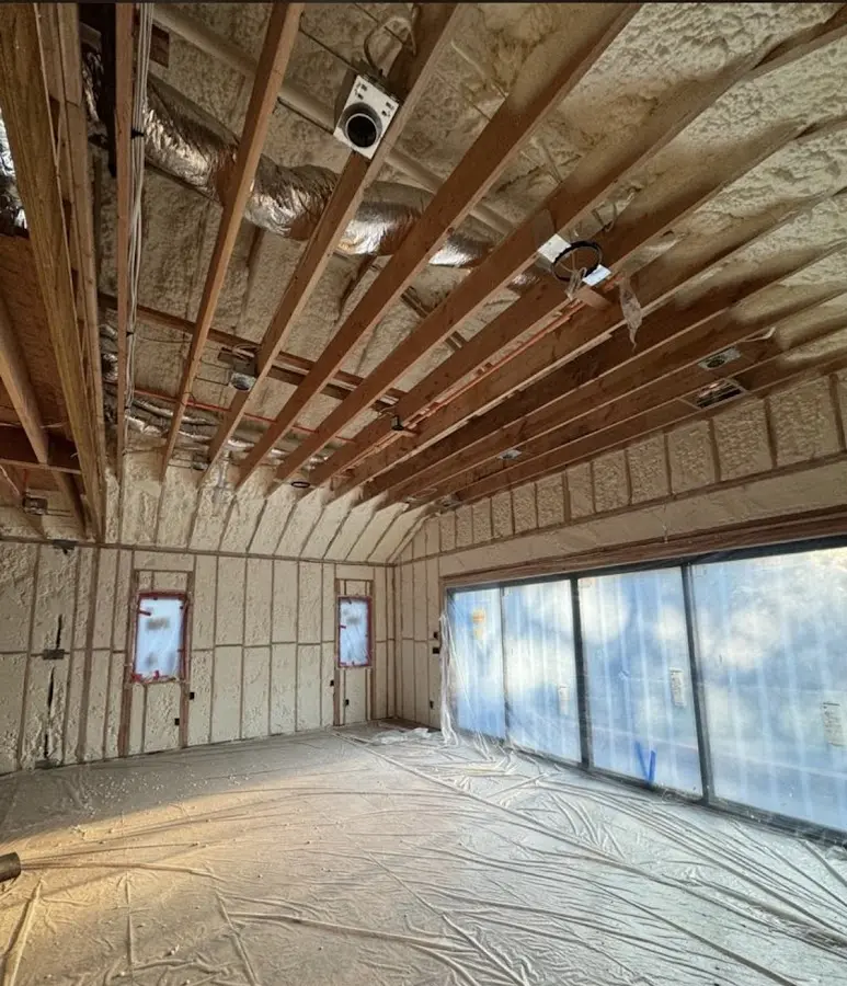 Interior walls and ceiling insulated with spray foam during new construction in Lake Arrowhead